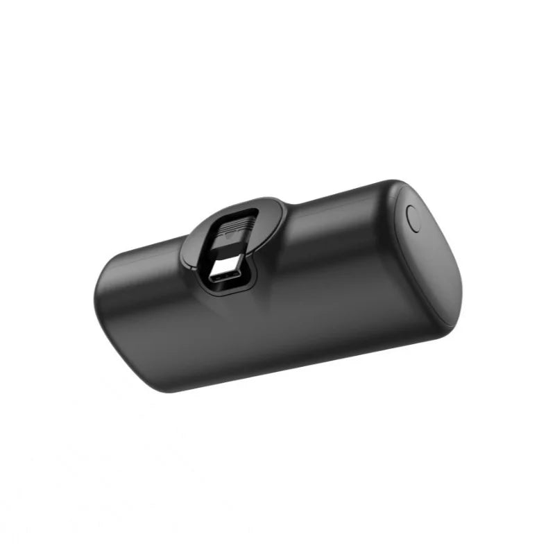 Black cylindrical device with a power button on a white background
