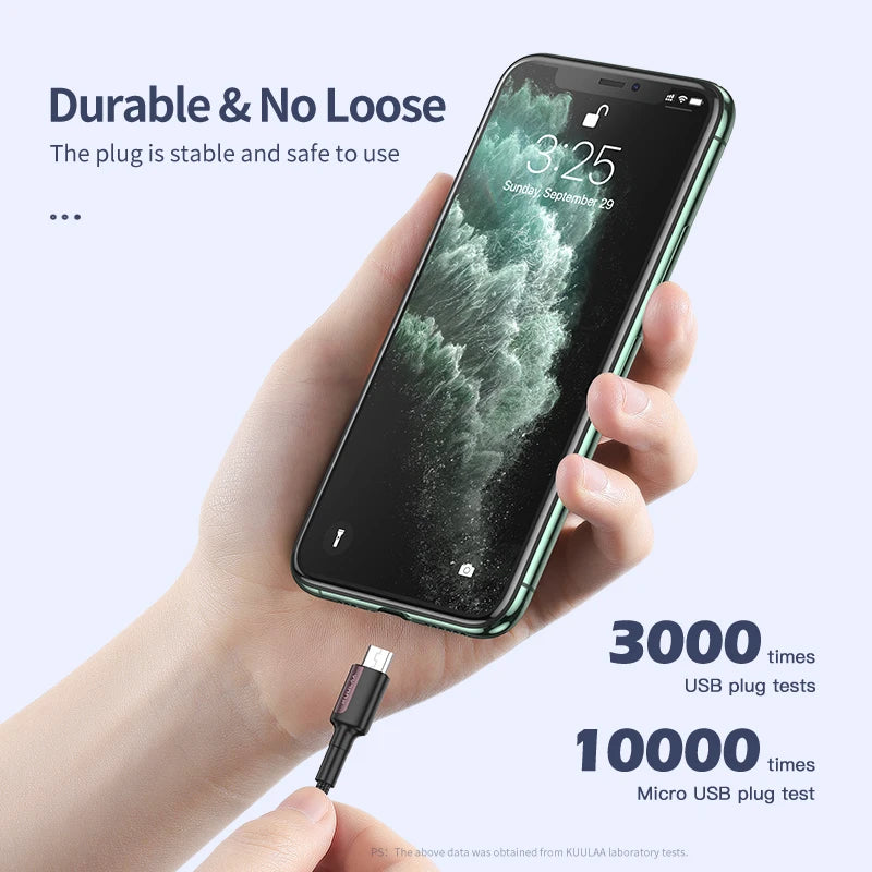Hand holding a smartphone with a charging cable, displaying durability and usage statistics.