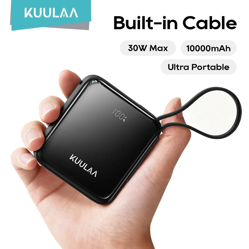KUULAA power bank with built-in cable held in a hand, displaying specifications on a white background.