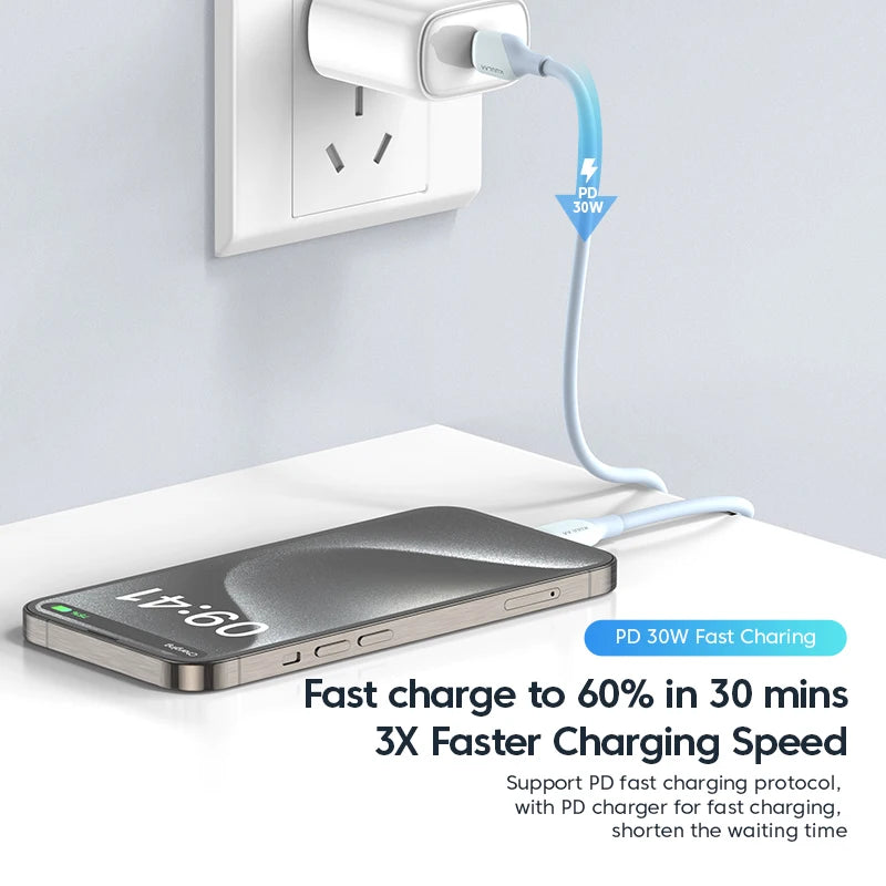 Phone being charged with a cable, text about fast charging speed, and power outlet in the background.