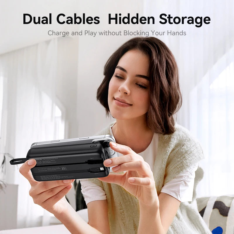 Woman holding a device with dual cables and hidden storage feature.