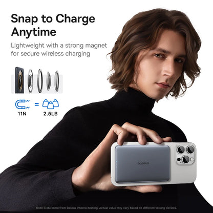 Person holding a phone with a magnetic charging case, text about snap-to-charge feature.